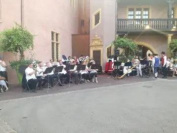 Folklore dancing in the evening at Colmar, Alsace (France)